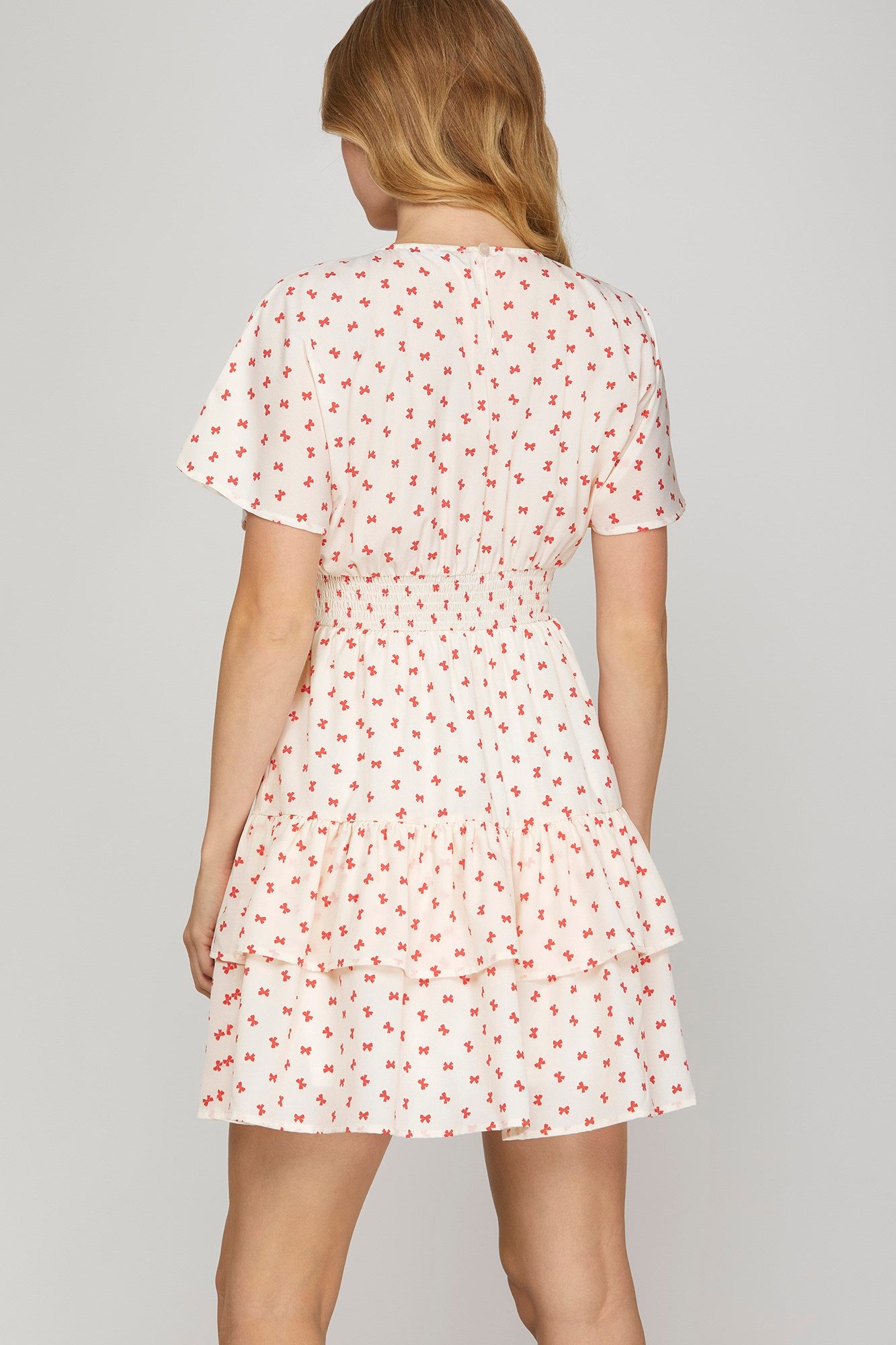 Lila Flutter Smocked Mini Dress