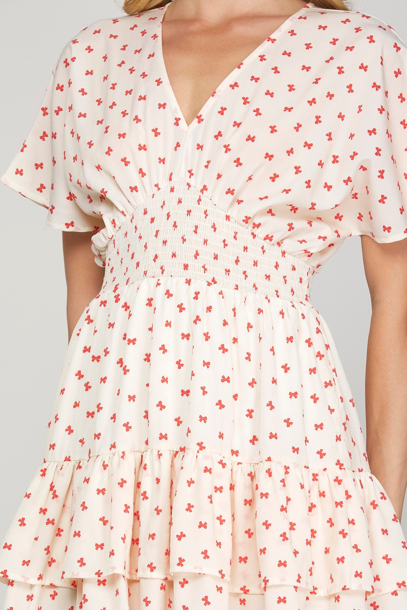 Lila Flutter Smocked Mini Dress